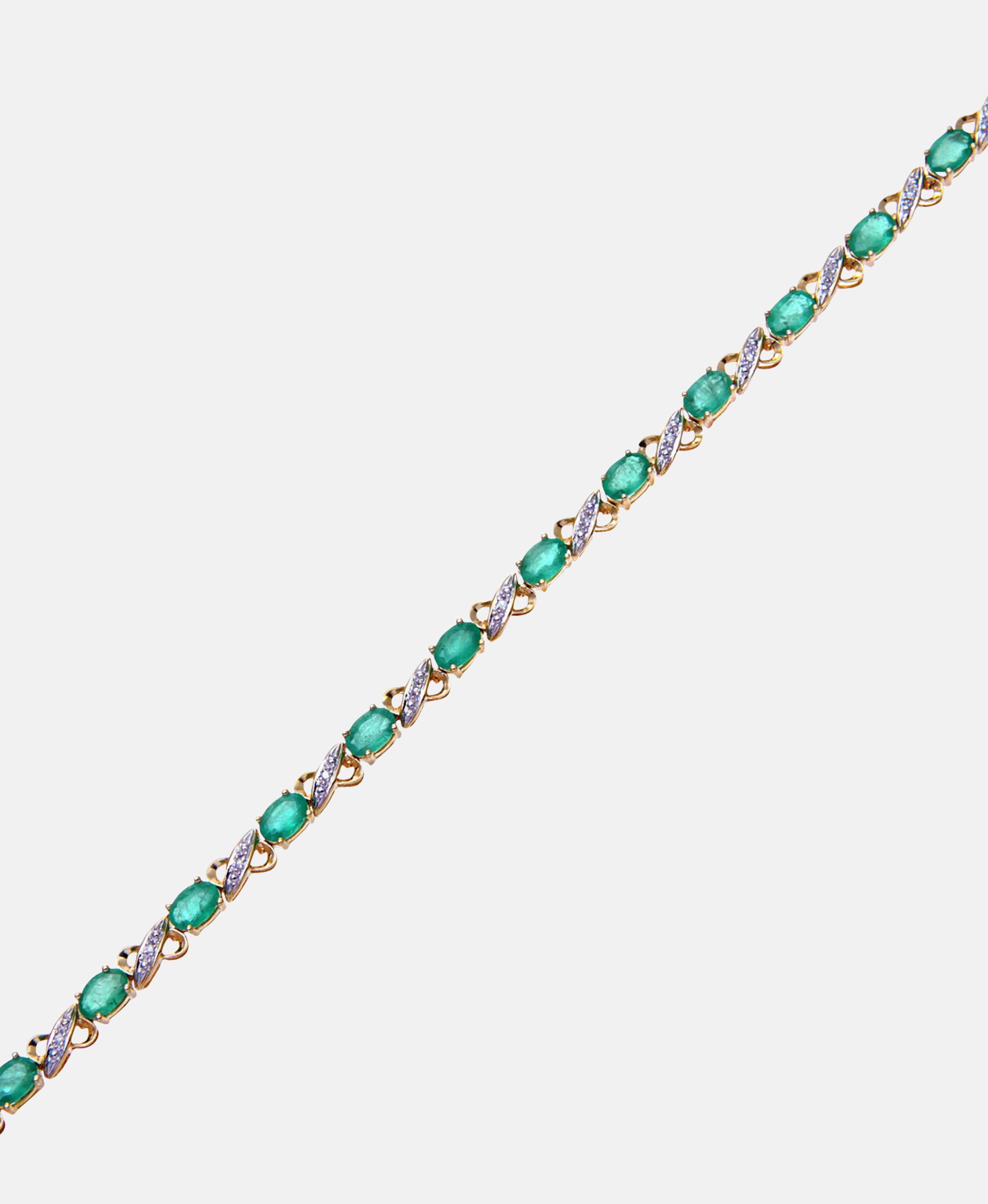 Armband aus 375 Gelbgold mit Diamant mit Smaragd