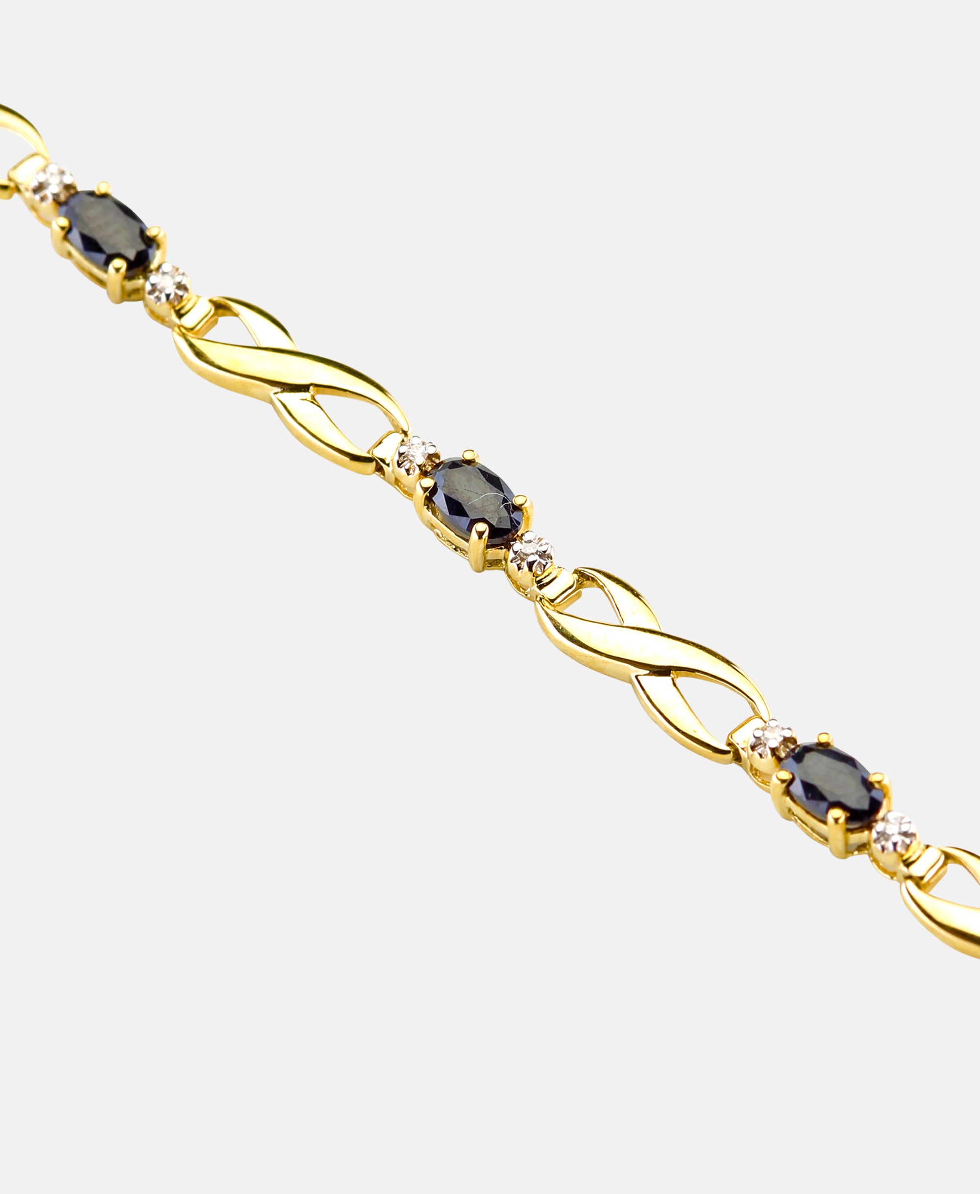 Armband aus 375 Gelbgold mit Diamant mit Saphir