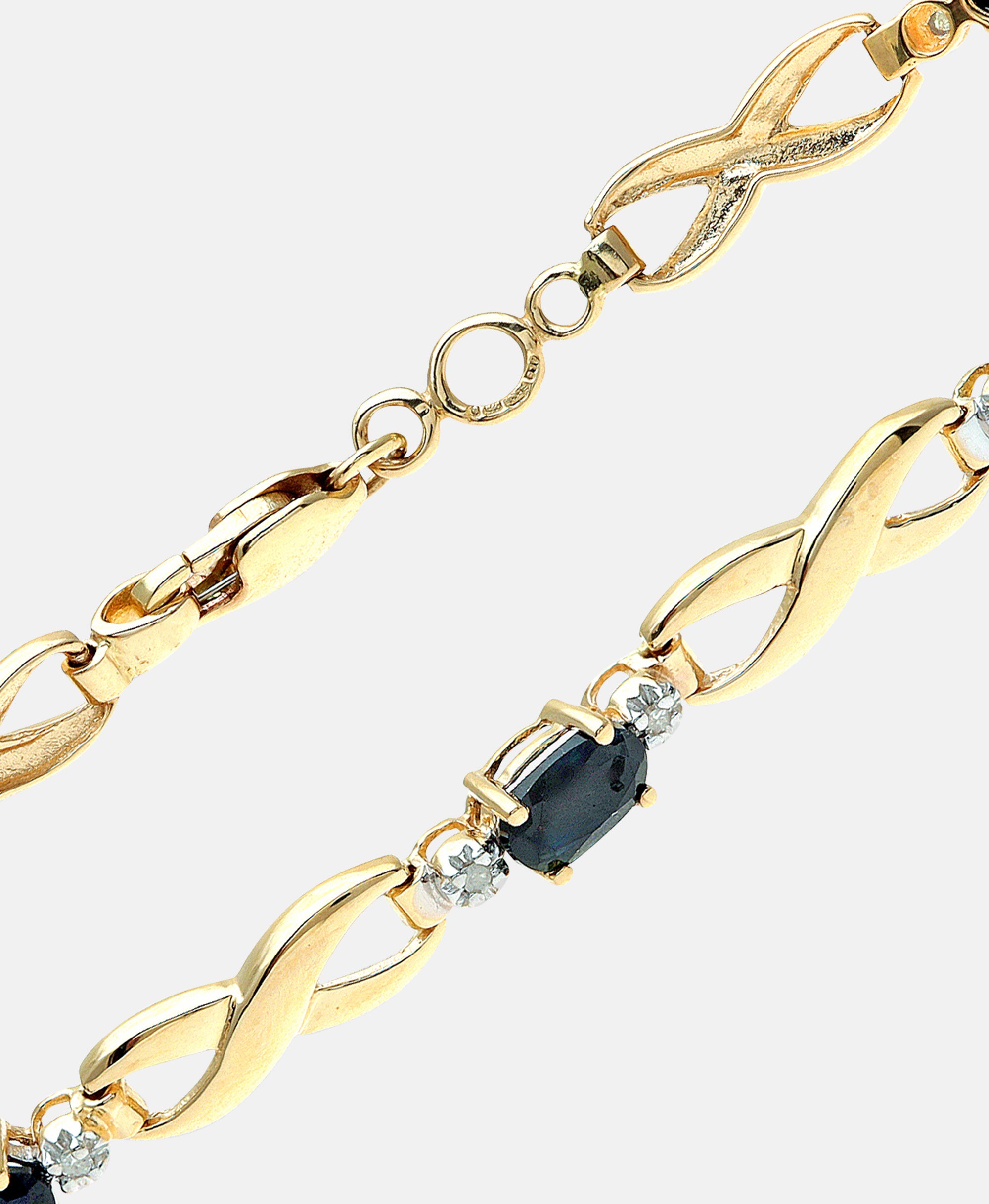 Armband aus 375 Gelbgold mit Diamant mit Saphir