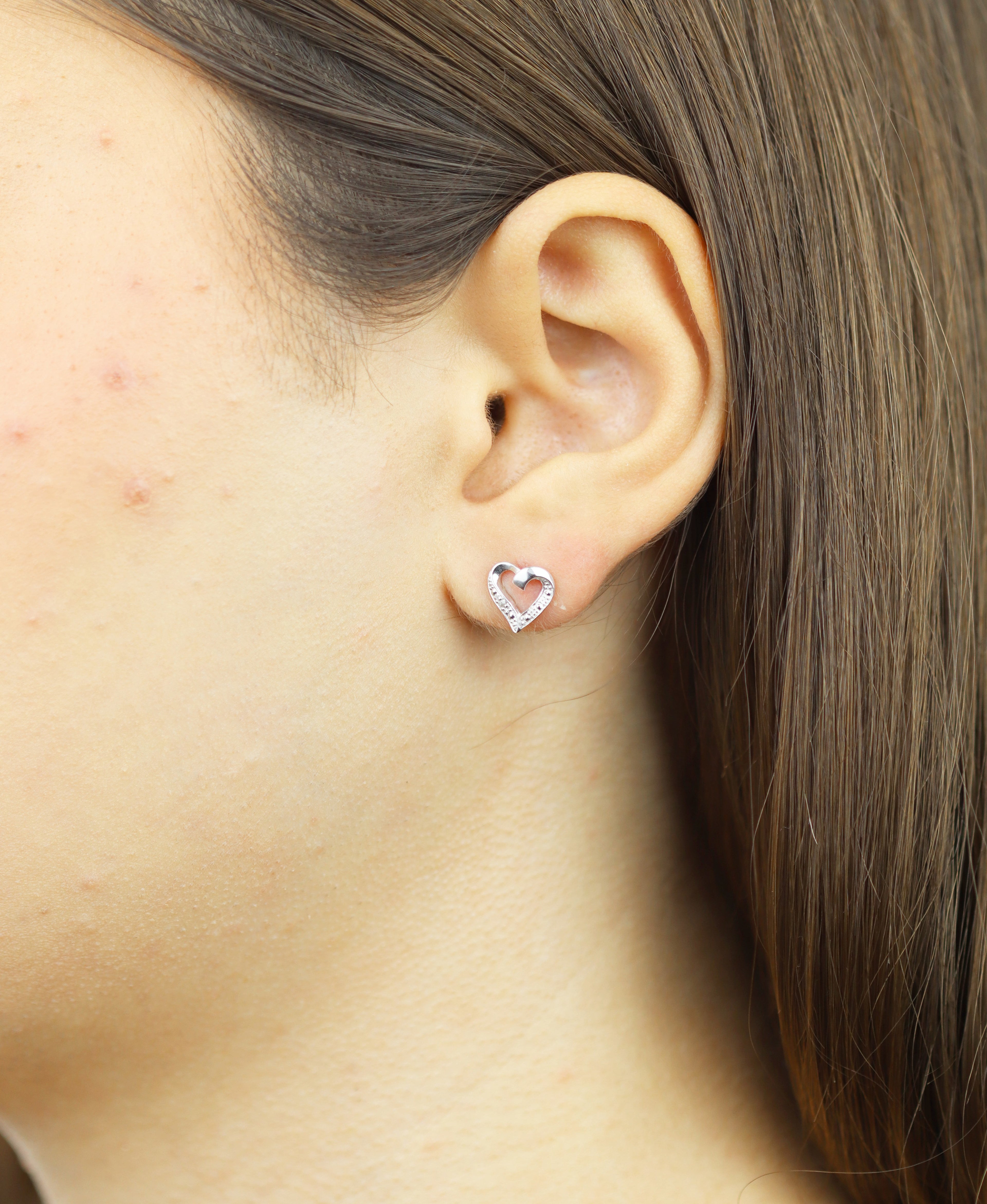 Ohrstecker aus 375 Weißgold mit Diamant Herz-Design