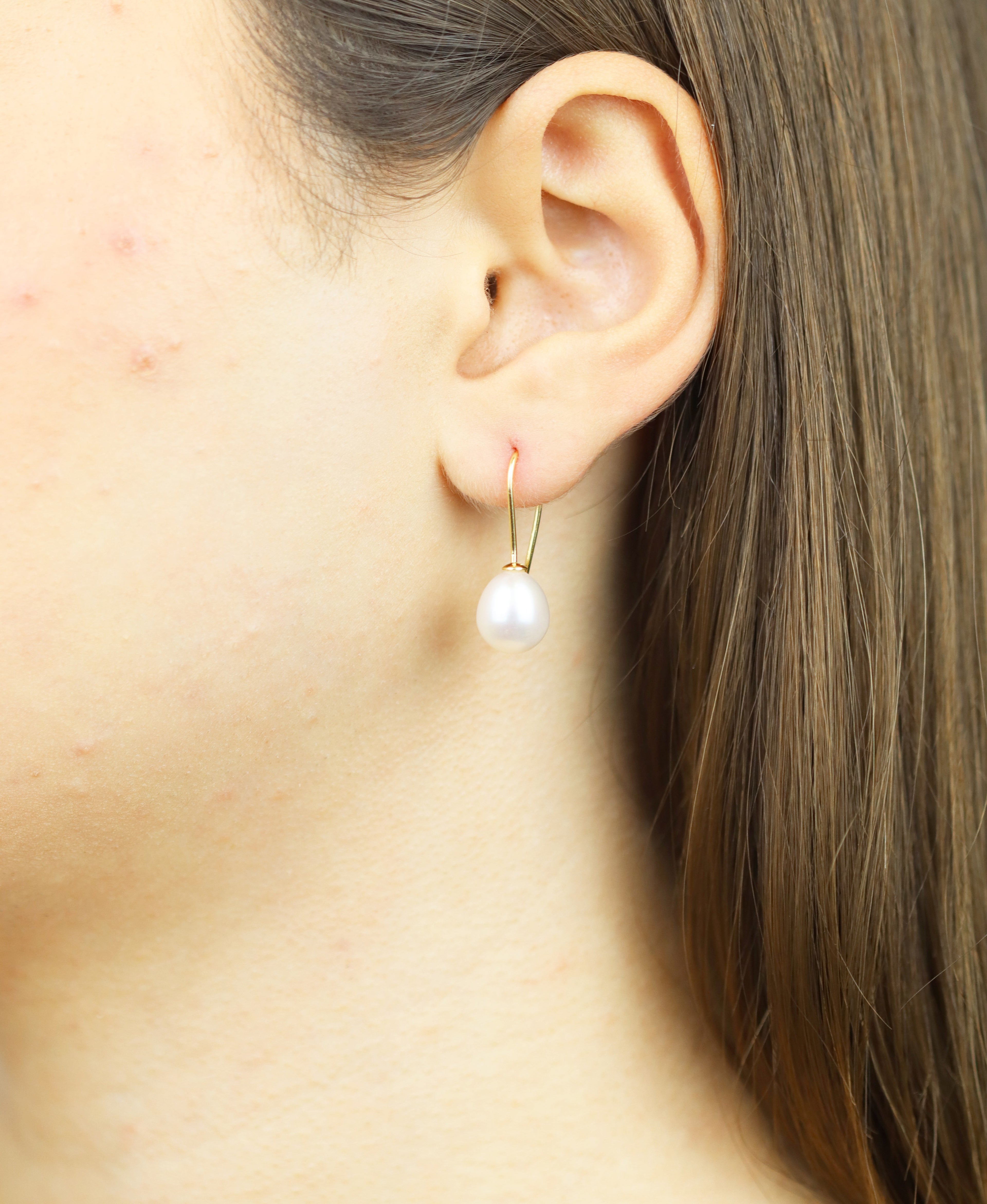 Ohrringe aus 750 Gelbgold mit Perle