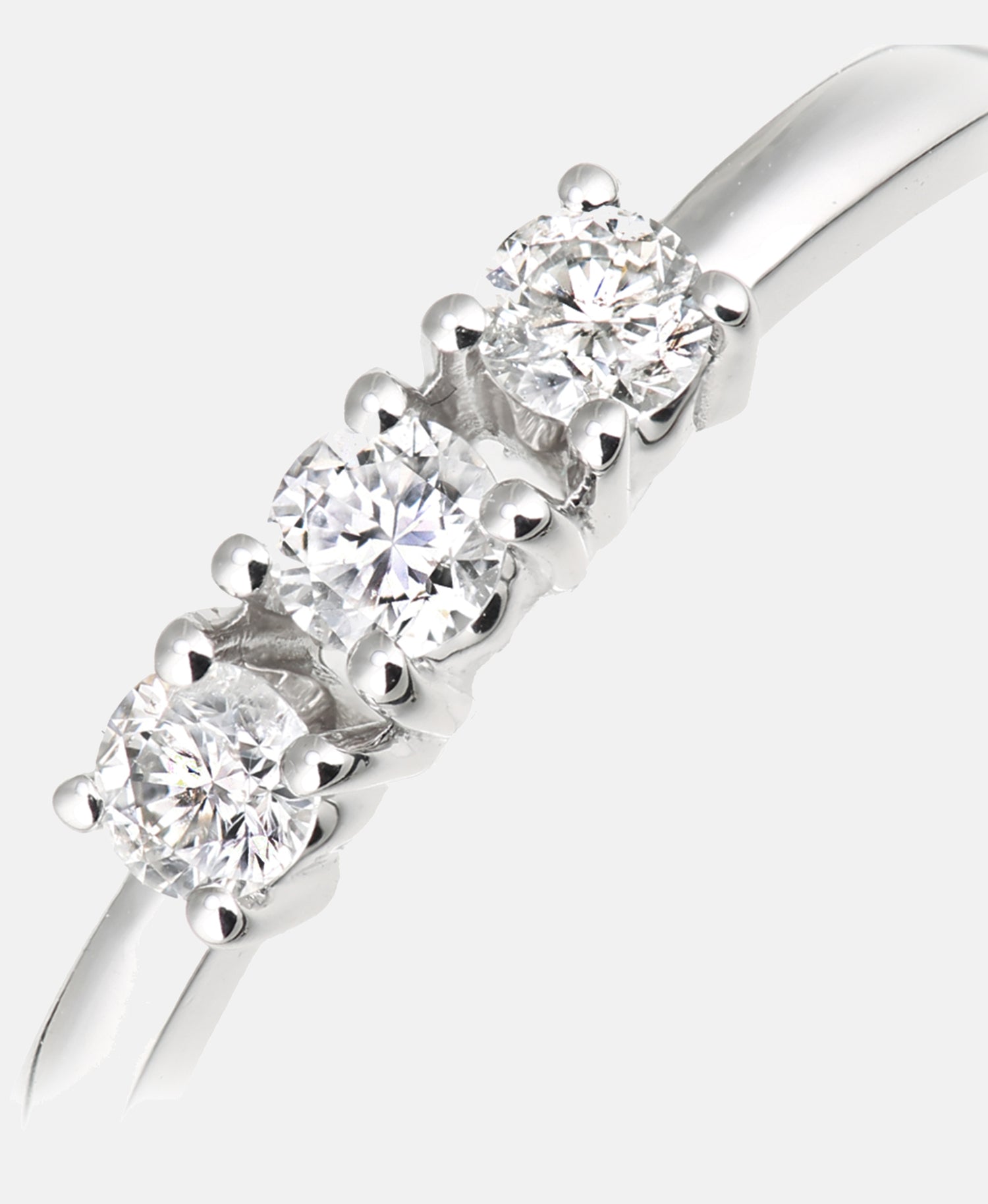 Trilogie-Ring aus 750 Weißgold mit 0.2 Karat Diamant