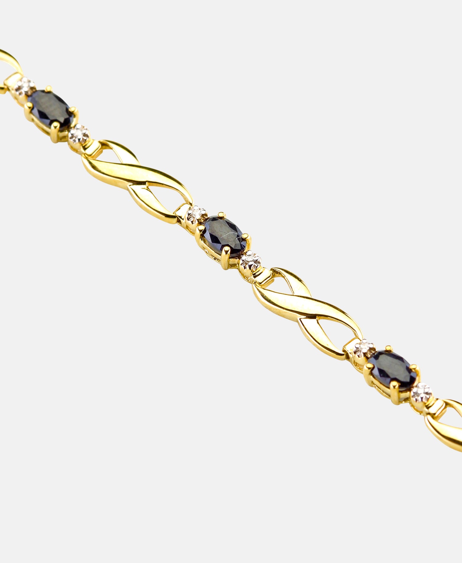Armband aus 375 Gelbgold mit Diamant mit Saphir