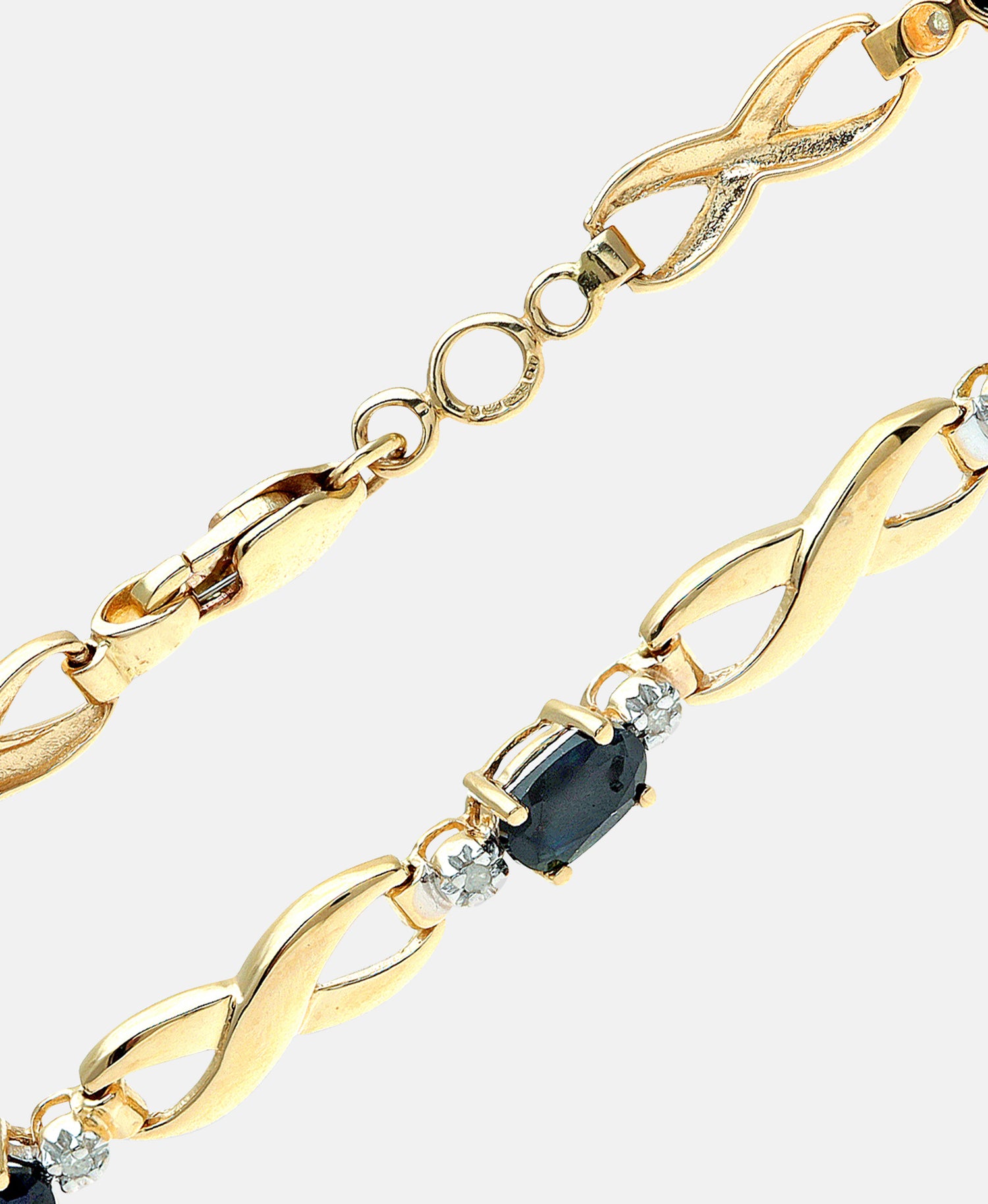 Armband aus 375 Gelbgold mit Diamant mit Saphir