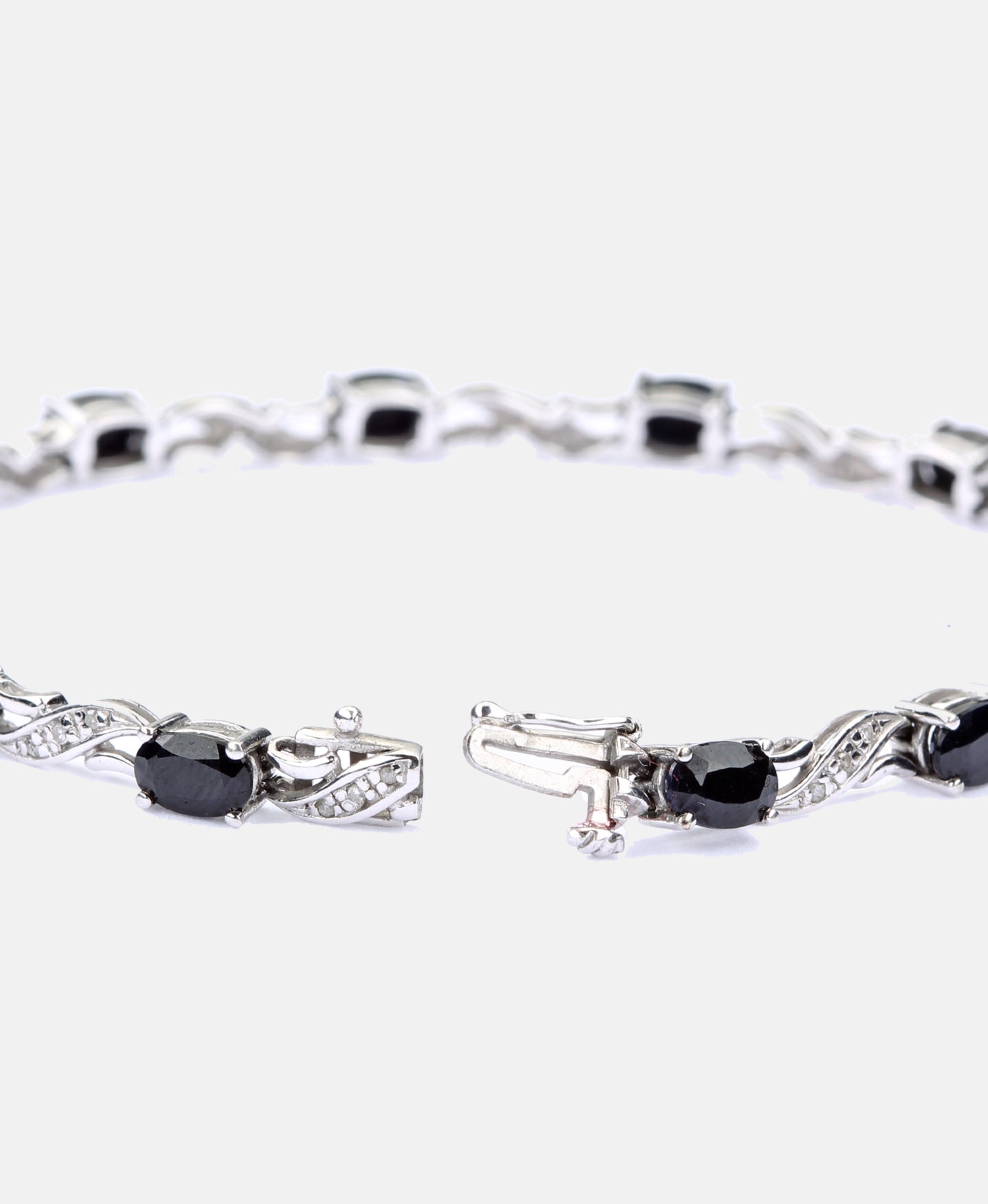 Armband aus 375 Gelbgold mit Diamant mit Saphir
