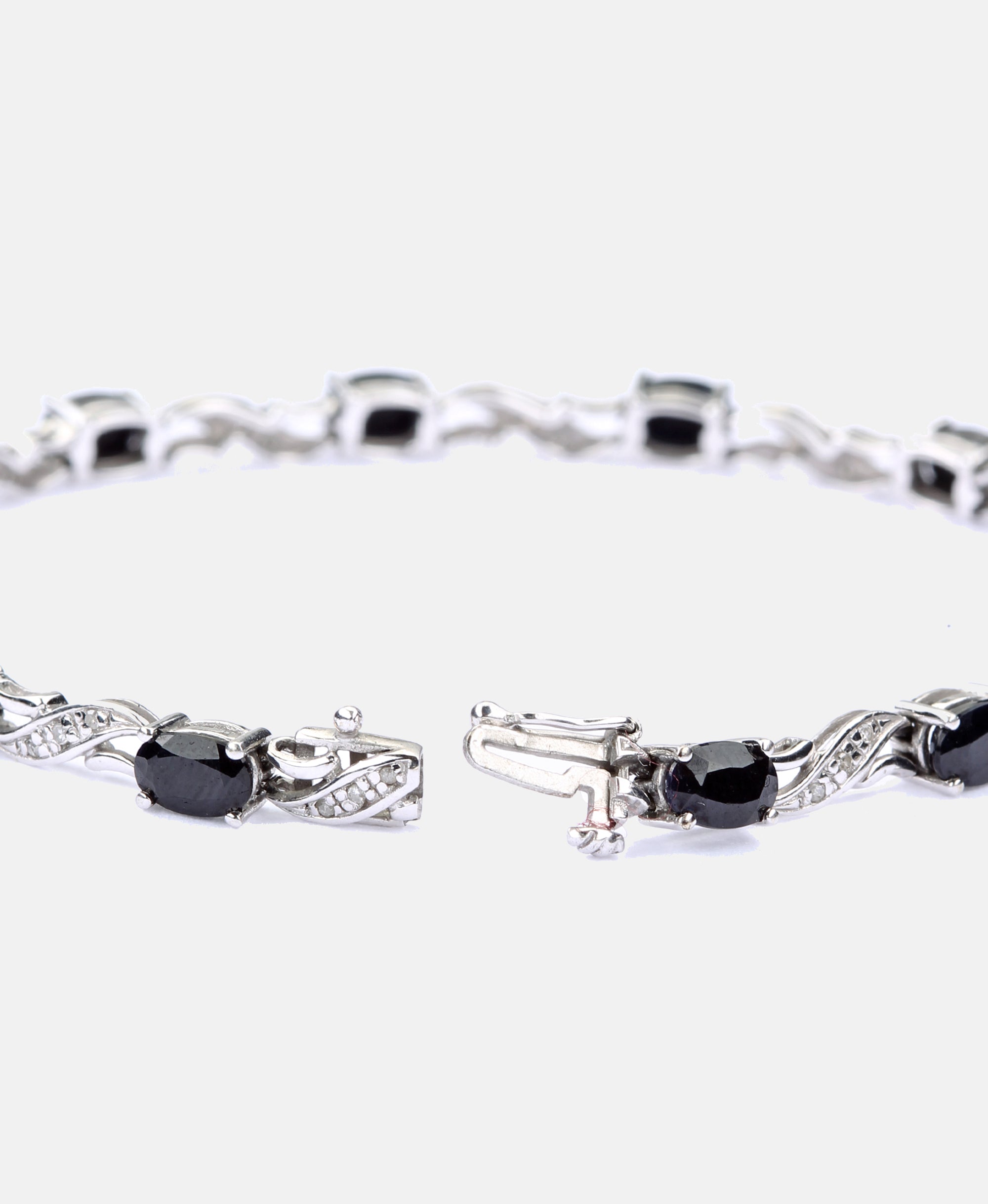 Armband aus 375 Gelbgold mit Diamant mit Saphir